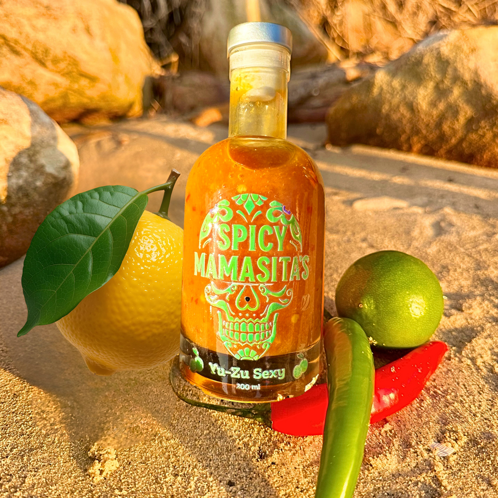 Spicy Yuzu Hot Sauce bottle labeled YuZu Sexy Hot Sauce with citrus illustrations, showcasing a vibrant, spicy condiment from My Store